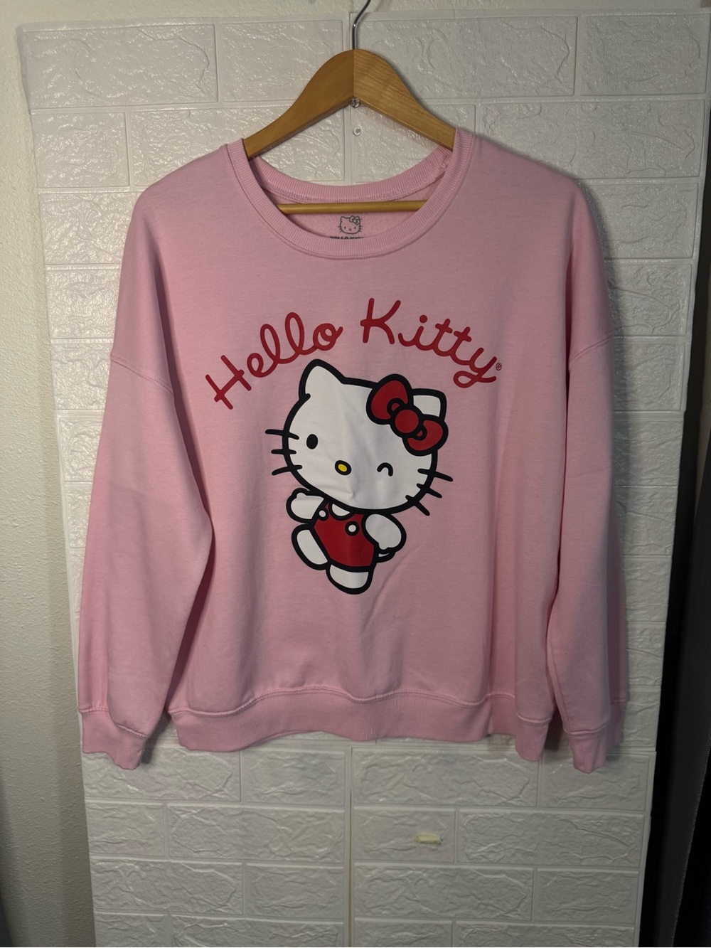 Sanrio Hello Kitty Light Pink Graphic Tee with Red Bow Detail